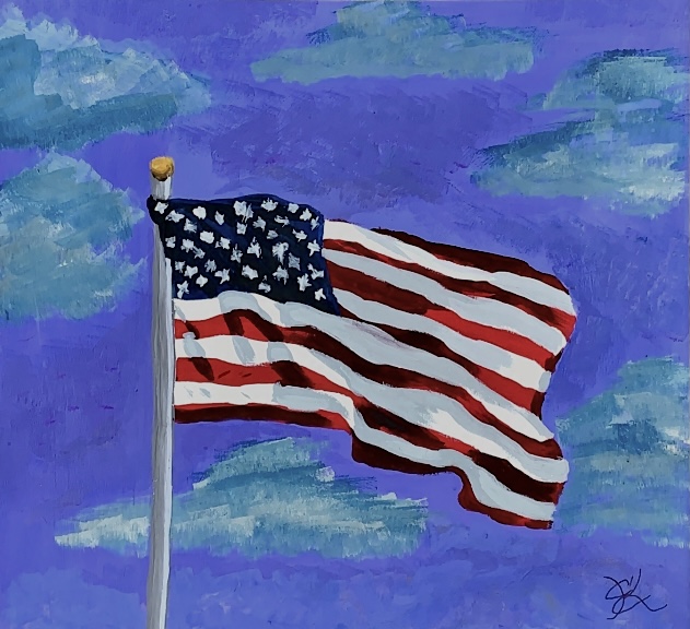 A USA flag blowing in the wind