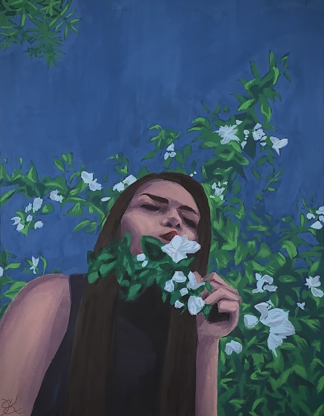 Self portrait with foliage in frame